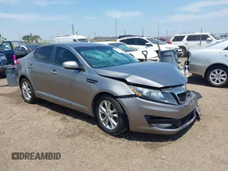 2013 Kia Optima EX z VIN 5XXGN4A7XDG258162, wystawiony jako IAAI lot #42228606 z przebiegiem 129 296 mil mil oraz . Historia ofert i sprzedaży dostępna na DreamBid. Obrazek 1.