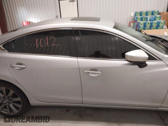 2018 Mazda 6 Touring with VIN JM1GL1VM8J1312778, listed as a IAAI auction lot 41387098 with 129,611 mi miles and . Bid and sale history available at carsss.com. Image 13.