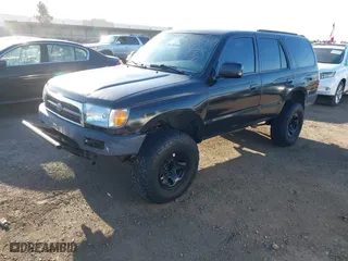 1998 Toyota 4Runner with VIN JT3GM84R6W0028070, listed as a IAAI auction lot 41850921 with 176,871 mi miles. Bid and sale history available at carsss.com. Image 2.
