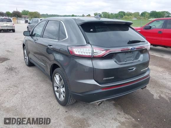 2015 Ford Edge Titanium z VIN 2FMTK3K81FBB88882, wystawiony jako IAAI lot #42184698 z przebiegiem 161 858 mil mil oraz . Historia ofert i sprzedaży dostępna na DreamBid. Obrazek 3.
