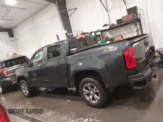 2020 Chevrolet Colorado 4WD Z71 with VIN 1GCGTDEN1L1163546, listed as a IAAI auction lot 41706719 with 64,662 mi miles and . Bid and sale history available at DreamBid. Image 14.