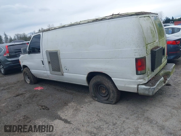 2000 Ford Econoline Cargo with VIN 1FTNE24LXYHB44580, listed as a IAAI auction lot 41906191 with 244,342 mi miles and . Bid and sale history available at DreamBid. Image 3.