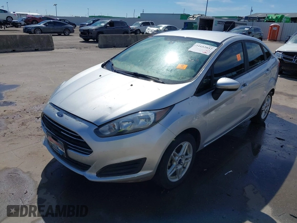 2019 Ford Fiesta SE with VIN 3FADP4BJXKM146258, listed as a IAAI auction lot 41652852 with 94,379 mi miles. Bid and sale history available at carsss.com. Image 2.