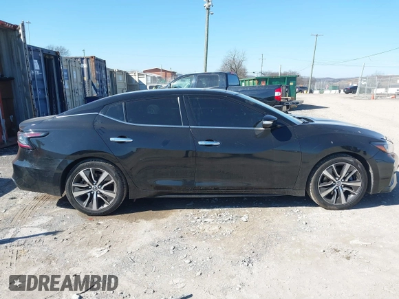 2019 Nissan Maxima Platinum z VIN 1N4AA6AV0KC365901, wystawiony jako IAAI lot #41473793 z przebiegiem 137 772 mil mil oraz . Historia ofert i sprzedaży dostępna na DreamBid. Obrazek 13.