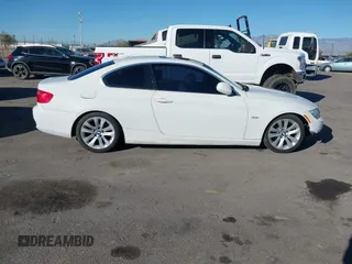 2012 BMW 3 Series 328i with VIN WBAKE5C53CJ106162, listed as a IAAI auction lot 41330065 with 160,624 mi miles and . Bid and sale history available at carsss.com. Image 14.