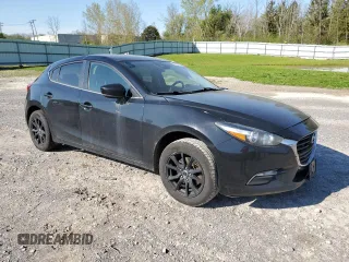 2017 Mazda 3 Touring with VIN 3MZBN1L78HM132387, listed as a Copart auction lot 56658705 with 123,507 mi miles and Salvage title. Bid and sale history available at DreamBid. Image 4.