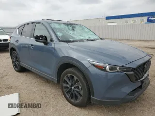 2024 Mazda CX-5 S Carbon Edition z VIN JM3KFBCL0R0446324, wystawiony jako Copart lot #54892965 z przebiegiem 17 146 mil mil oraz Szkoda całkowita • Salvage title. Historia ofert i sprzedaży dostępna na DreamBid. Obrazek 4.
