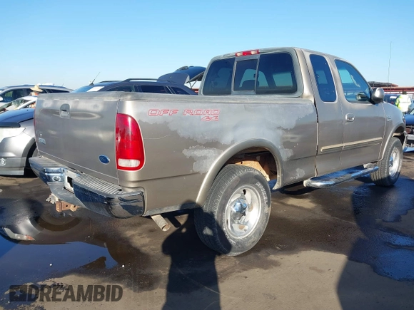 2001 Ford F-150 XL with VIN 1FTRX18L31NA75349, listed as a IAAI auction lot 40921255 with 165,872 mi miles. Bid and sale history available at carsss.com. Image 4.