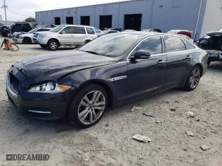 2012 Jaguar XJ with VIN SAJWA2GB7CLV30495, listed as a Copart auction lot 43556065 with 143,589 mi miles and Salvage Title. Bid and sale history available at carsss.com. Image 1.