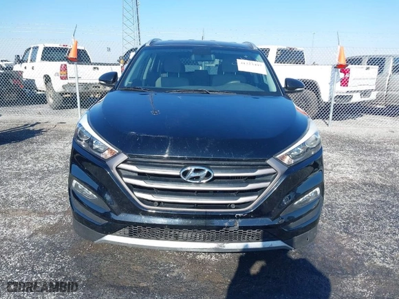 2016 Hyundai Tucson Limited with VIN KM8J33A27GU237225, listed as a IAAI auction lot 41223497 with 158,986 mi miles. Bid and sale history available at carsss.com. Image 12.