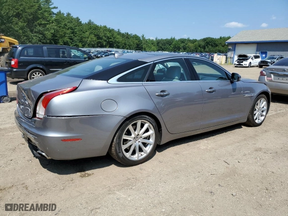 2013 Jaguar XJ with VIN SAJWA1C75D8V41995, listed as a Copart auction lot 65971344 with NaN miles and Salvage Title. Bid and sale history available at carsss.com. Image 3.