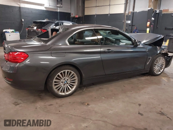 2014 BMW 4 Series 428i xDrive with VIN WBA3T1C59EPS98299, listed as a IAAI auction lot 41741235 with 93,000 mi miles and . Bid and sale history available at carsss.com. Image 4.