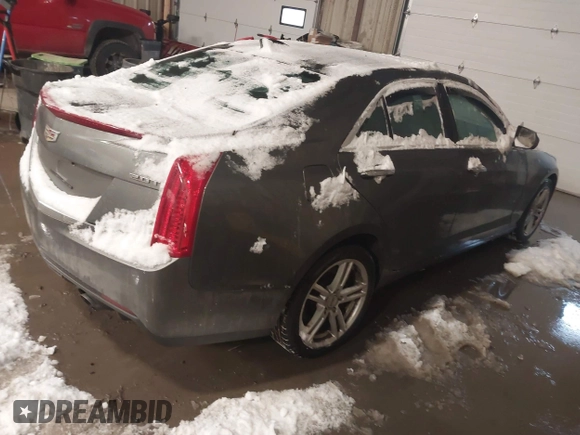 2016 Cadillac ATS Standard AWD z VIN 1G6AG5RX4G0120667, wystawiony jako IAAI lot #41512947 z przebiegiem 106 209 mil mil oraz . Historia ofert i sprzedaży dostępna na DreamBid. Obrazek 4.