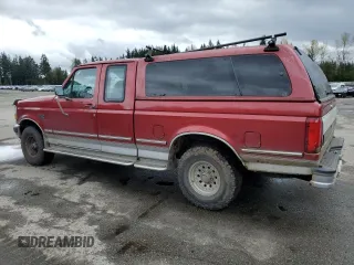 1993 Ford F-150 with VIN 1FTEX14H6PKB86844, listed as a Copart auction lot 52012705 with 127,784 mi miles and Salvage title. Bid and sale history available at DreamBid. Image 2.