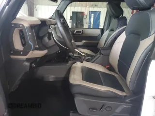 2023 Ford Bronco z VIN 1FMEE5DP9PLC00732, wystawiony jako Copart lot #60123165 z przebiegiem 10 672 mil mil oraz Szkoda całkowita • Salvage title. Historia ofert i sprzedaży dostępna na DreamBid. Obrazek 7.