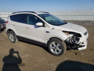 2014 Ford Escape SE z VIN 1FMCU9G9XEUB66869, wystawiony jako Copart lot #59546115 z przebiegiem 224 021 mil mil oraz Szkoda całkowita • Salvage title. Historia ofert i sprzedaży dostępna na DreamBid. Obrazek 4.