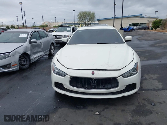 2014 Maserati Ghibli S Q4 with VIN ZAM57RTA3E1090350, listed as a IAAI auction lot 42056682 with 119,160 mi miles and . Bid and sale history available at DreamBid. Image 13.