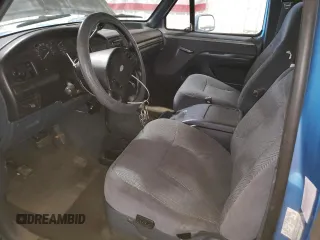 1993 Ford F-150 with VIN 1FTEX14N2PKB50753, listed as a Copart auction lot 61099185 with 144,074 mi miles and Salvage title. Bid and sale history available at DreamBid. Image 7.