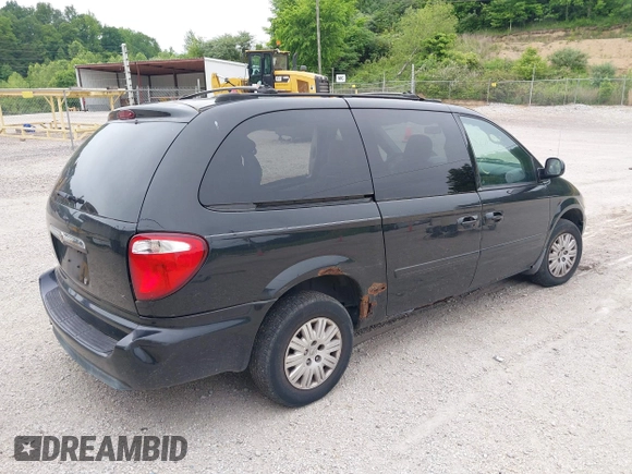 2006 Chrysler Town & Country LWB LX with VIN 2A4GP44R06R604215, listed as a IAAI auction lot 39411993 with 289,048 mi miles. Bid and sale history available at carsss.com. Image 4.