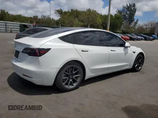 2021 Tesla Model 3 Standard Range Plus with VIN 5YJ3E1EA2MF985463, listed as a Copart auction lot 53311455 with 23,176 mi miles and Clean Title. Bid and sale history available at DreamBid. Image 3.