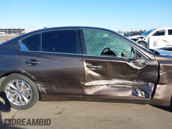2015 Infiniti Q50 Premium with VIN JN1BV7AP8FM351418, listed as a IAAI auction lot 41488091 with 151,421 mi miles. Bid and sale history available at carsss.com. Image 14.