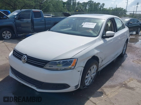 2013 Volkswagen Jetta SE with VIN 3VWDX7AJ1DM366935, listed as a IAAI auction lot 41961342 with Not provided miles and . Bid and sale history available at DreamBid. Image 2.