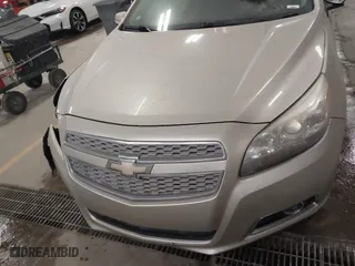 2013 Chevrolet Malibu LTZ with VIN 1G11H5SAXDF236151, listed as a IAAI auction lot 41720812 with 181,159 mi miles. Bid and sale history available at carsss.com. Image 12.