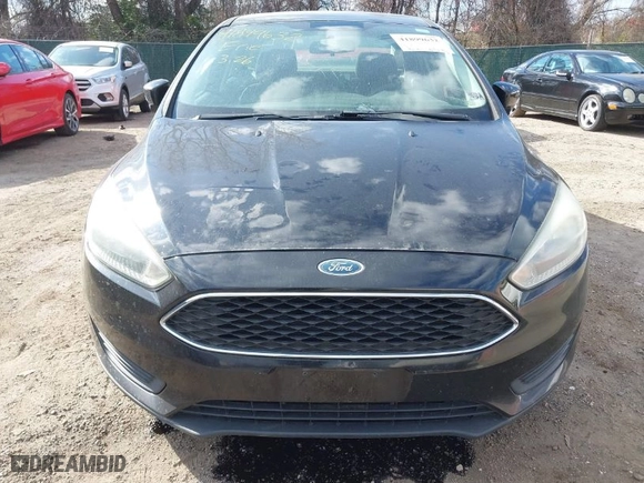 2015 Ford Focus SE with VIN 1FADP3F20FL296173, listed as a IAAI auction lot 41899632 with 136,572 mi miles. Bid and sale history available at carsss.com. Image 6.
