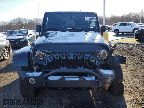 2014 Jeep Wrangler Sahara with VIN 1C4AJWBG9EL102983, listed as a Copart auction lot 84501554 with 120,372 mi miles and Salvage Title. Bid and sale history available at DreamBid. Image 5.