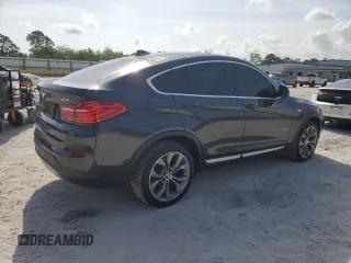 2017 BMW X4 xDrive28i with VIN 5UXXW3C36H0T79956, listed as a Copart auction lot 50156445 with 100,226 mi miles and Salvage title. Bid and sale history available at DreamBid. Image 3.