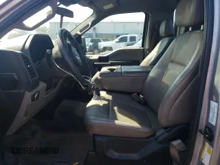2020 Ford F-150 XL with VIN 1FTMF1C50LKE01683, listed as a Copart auction lot 70235144 with 57,325 mi miles and Salvage Title. Bid and sale history available at carsss.com. Image 7.