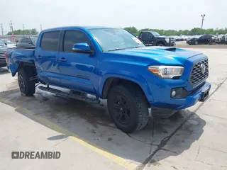 2018 Toyota Tacoma SR5 z VIN 5TFAZ5CN2JX064452, wystawiony jako IAAI lot #41945468 z przebiegiem 132 450 mil mil oraz . Historia ofert i sprzedaży dostępna na DreamBid. Obrazek 1.