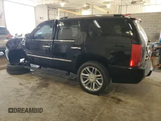 2011 Cadillac Escalade Platinum Edition z VIN 1GYS4DEF6BR193040, wystawiony jako Copart lot #56910155 z przebiegiem 132 754 mil mil oraz Szkoda całkowita • Salvage title. Historia ofert i sprzedaży dostępna na DreamBid. Obrazek 2.