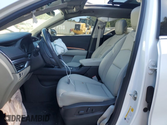 2019 Cadillac XT4 FWD Luxury z VIN 1GYAZAR45KF110798, wystawiony jako Copart lot #58872555 z przebiegiem 31 631 mil mil oraz Nie do naprawy • Non repairable. Historia ofert i sprzedaży dostępna na DreamBid. Obrazek 7.