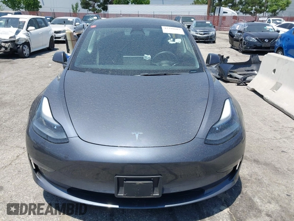 2023 Tesla Model 3 with VIN 5YJ3E1EA4PF400306, listed as a IAAI auction lot 42398603 with 18,551 mi miles and . Bid and sale history available at DreamBid. Image 13.