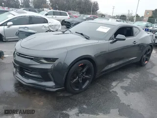 2017 Chevrolet Camaro 1LT with VIN 1G1FB1RX5H0216019, listed as a IAAI auction lot 41881997 with 84,505 mi miles. Bid and sale history available at carsss.com. Image 2.