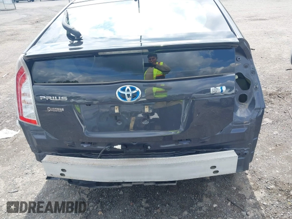 2014 Toyota Prius Four z VIN JTDKN3DUXE1816059, wystawiony jako IAAI lot #42268497 z przebiegiem 78 825 mil mil oraz . Historia ofert i sprzedaży dostępna na DreamBid. Obrazek 6.