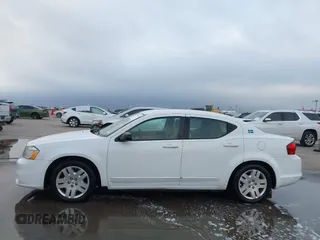 2012 Dodge Avenger SE with VIN 1C3CDZAG1CN251932, listed as a IAAI auction lot 41161291 with 95,481 mi miles and . Bid and sale history available at DreamBid. Image 14.