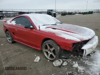 1996 Ford Mustang GT with VIN 1FALP42X9TF101569, listed as a Copart auction lot 45700545 with 119,083 mi miles and Salvage title. Bid and sale history available at DreamBid. Image 4.