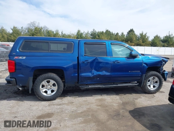 2017 Chevrolet Silverado 1500 LT with VIN 3GCUKREC5HG363503, listed as a IAAI auction lot 41833304 with 133,130 mi miles and . Bid and sale history available at DreamBid. Image 12.
