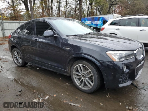 2016 BMW X4 xDrive28i with VIN 5UXXW3C59G0R20451, listed as a Copart auction lot 76909023 with 96,076 mi miles. Bid and sale history available at carsss.com. Image 4.