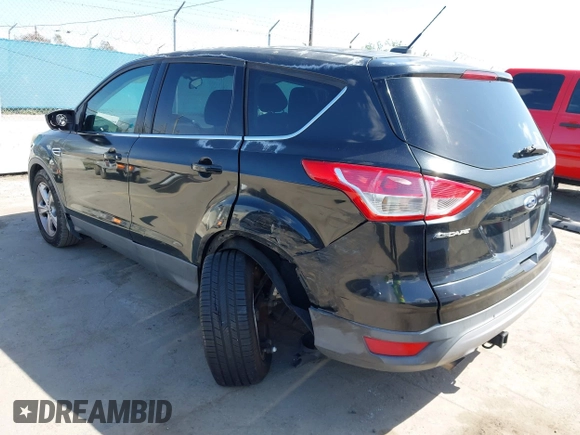 2015 Ford Escape SE with VIN 1FMCU0G91FUA18588, listed as a IAAI auction lot 41958047 with 111,523 mi miles. Bid and sale history available at carsss.com. Image 3.