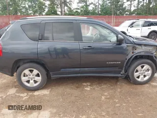 2014 Jeep Compass Sport with VIN 1C4NJCBA1ED725875, listed as a IAAI auction lot 42118863 with 133,136 mi miles. Bid and sale history available at carsss.com. Image 14.