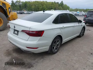 2021 Volkswagen Jetta S z VIN 3VWC57BU6MM020180, wystawiony jako IAAI lot #42263574 z przebiegiem 68 384 mil mil oraz . Historia ofert i sprzedaży dostępna na DreamBid. Obrazek 4.