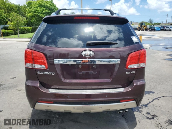 2012 Kia Sorento SX with VIN 5XYKW4A29CG308152, listed as a Copart auction lot 64895355 with 126,816 mi miles and Salvage title. Bid and sale history available at DreamBid. Image 6.