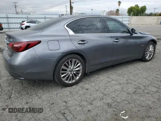 2019 Infiniti Q50 Luxe z VIN JN1EV7AP6KM513800, wystawiony jako Copart lot #51117555 z przebiegiem 92 337 mil mil oraz Szkody całkowita. Historia ofert i sprzedaży dostępna na DreamBid. Obrazek 3.