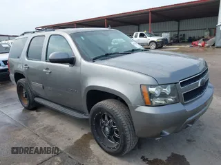 2012 Chevrolet Tahoe LS z VIN 1GNSCAE0XCR259083, wystawiony jako IAAI lot #41912385 z przebiegiem 163 614 mil mil oraz . Historia ofert i sprzedaży dostępna na DreamBid. Obrazek 1.
