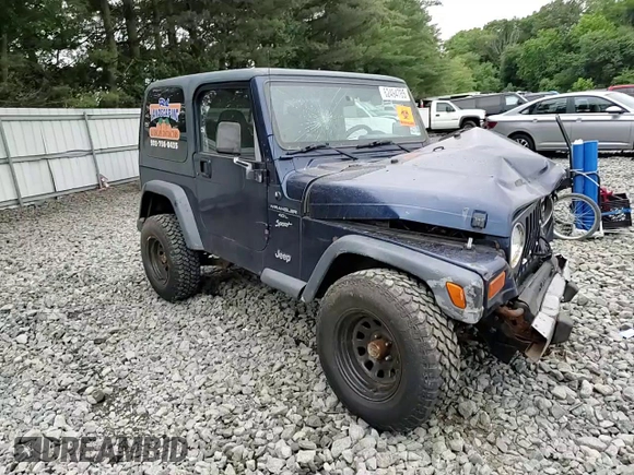 2001 Jeep Wrangler Sport with VIN 1J4FA49S01P363856, listed as a Copart auction lot 62494785 with 154,782 mi miles and Salvage title. Bid and sale history available at DreamBid. Image 12.