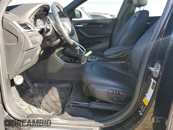 2016 BMW X1 xDrive28i z VIN WBXHT3C35G5E50005, wystawiony jako Copart lot #74476533 z przebiegiem 128 031 mil mil oraz Szkoda całkowita • Salvage title. Historia ofert i sprzedaży dostępna na DreamBid. Obrazek 7.