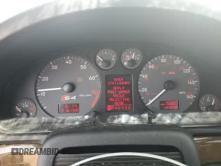 2002 Audi S4 z VIN WAUXD68D32A000646, wystawiony jako Copart lot #52432765 z przebiegiem 124 000 mil mil oraz Szkoda całkowita • Salvage title. Historia ofert i sprzedaży dostępna na DreamBid. Obrazek 9.